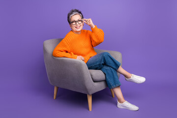 Fototapeta na wymiar Full length body photo of confident satisfied psychologist therapy entrepreneur woman touch eyeglasses isolated on purple color background