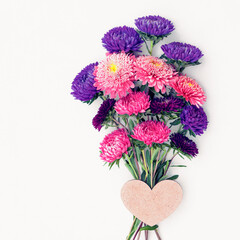 Bright cute bouquet of asters isolated on white background