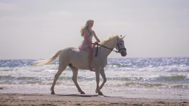 Girl On A Unicorn At A Beach