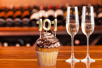 Cupcake With Numbers And Glasses With Wine For Birthday Or Anniversary