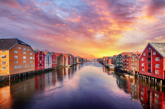 Colorful houses over water in Trondheim city - Norway © Manish
