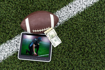 American football app video game on smartphone.. Mobile phone and american football ball and helmet isolated on white. 3d illustration