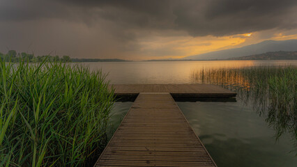 Fototapeta na wymiar Sunset on a mountain lake