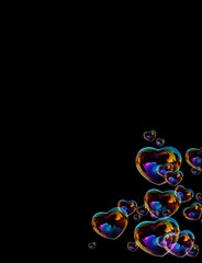 Colorful transparent bubbles on black