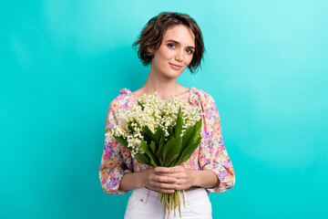 Photo of stunning positive lady hands hold bouquet fresh flowers isolated on bright aquamarine...