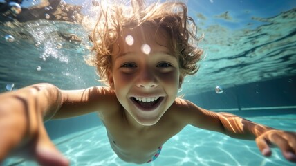 Happy kid having fun swimming underwater, Healthy lifestyle, people water sport activity, swimming lessons on holidays with kids. - obrazy, fototapety, plakaty