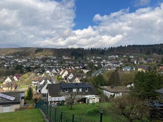 A View from above of a hill on a village