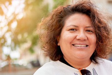 portrait of latin woman smiling at camera. Proud woman from Ecuador. Hispanic heritage