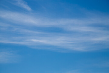 Blue sky cirrus clouds. Clear blue sky.