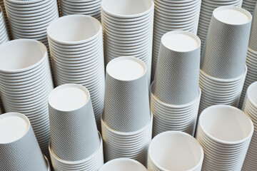 Set of many disposable paper cups in for coffee, tea or any other hot beverage.