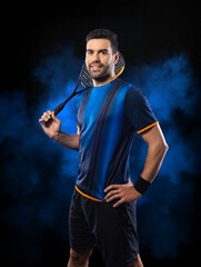 Squash player on a squash court with racket. Man athlete with racket on court with neon colors....