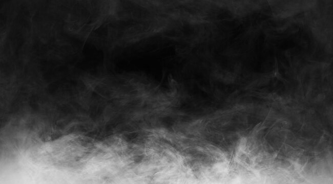Abstract smoke texture over black. Fog in the darkness.