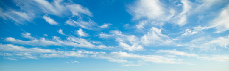 Naklejka na ściany i meble Blue sky background with clouds natural background
