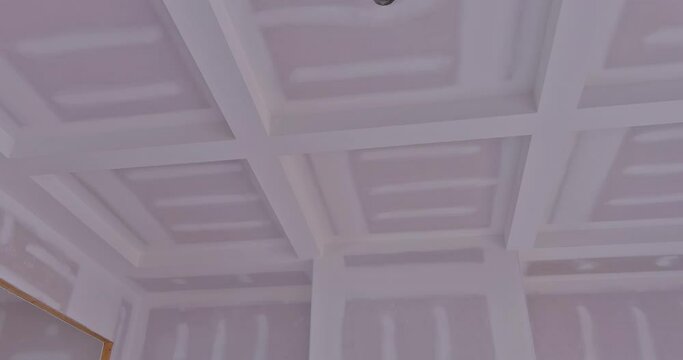 After drywalling plastering of new house under construction has been completed house is ready to be painted interior is now finished