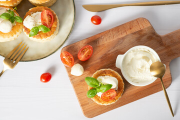 puffs with mozzarella and tomatoes