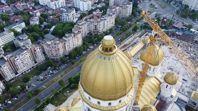 4K Drone flyover footage of the under construction Catedrala Mantuirii Neamului in Bucharest. People's Salvation Cathedral - the tallest and largest Eastern Orthodox church building.