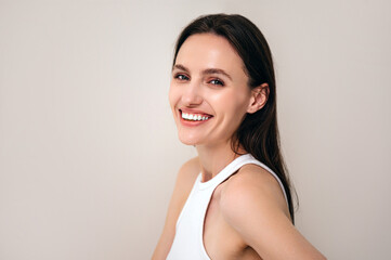 happy female with laminated eyebrows looking at camera