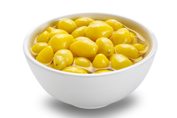 Side view of ginkgo seeds in syrup in white ceramic bowl isolated on white background with clipping path.