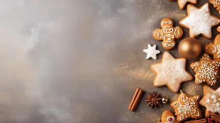 Fotobehang Christmas background with gingerbread cookies. Christmas greeting card with gingerbread cookies over grey background, top view. Flat lay with copy space for xmas greetings. © Alina