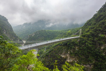 Blow Bay Suspension Bridge or Mountain Moon bridge. A impressive breathtaking suspension bridge in the Taroko National park. View from the Buluowan Terrace Observation Deck. Taiwan landscape Nature