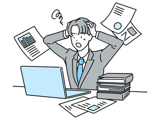 デスクワーク中に頭を抱えて悩む男性・ビジネスマン