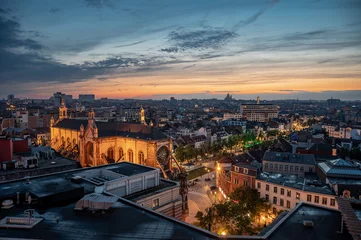 Fotobehang Brussels city center, Belgium - Colorful sunset over old town with the Saint Catherine church and rooftops © Werner