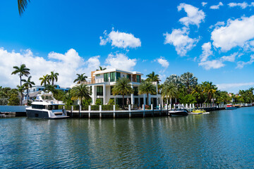 modern villa with private yacht on summer vacation. dreamy destination for summer vacation in...