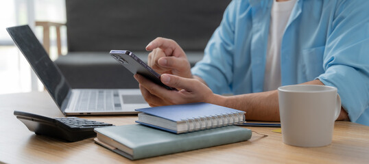 Man hands using laptop and holding credit card with social media as Online shopping concept in morning light