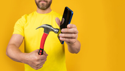 photo of hack the phone screen with hammer, advertisement.