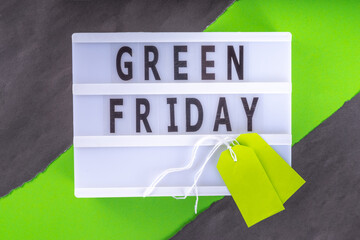 Green Friday concept with green sale and discounts tag, conscious and environmentally friendly...