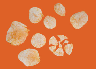 Some chips on a colored surface