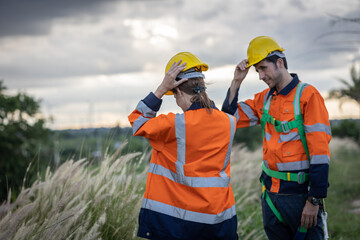 Engineer electricity technician  team rest stop working strom cloudy raining sky for safety
