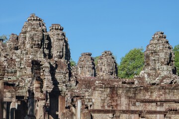 Fototapeta na wymiar Bayon, the notable Khmer temple in Angkor, built as King Jayavarman VII's official state temple in the late 12th or early 13th century.