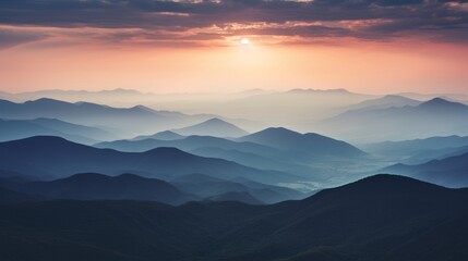 the sun is setting over the mountains in this photo - Powered by Adobe