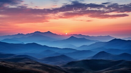 Naklejka premium the sun setting over the mountains in this photo