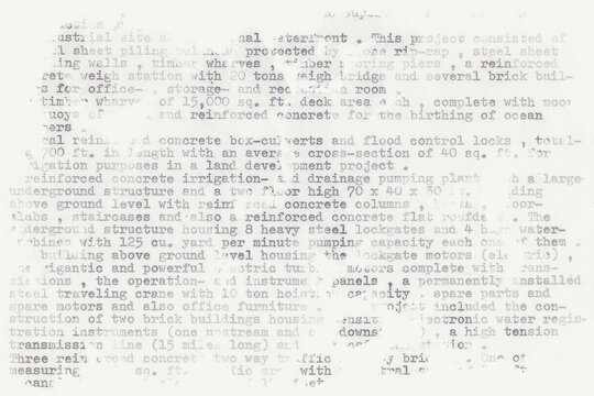 Text written on an old typewriter. It is a partly blurred close-up of a  resume of a civil engineer who has worked in the sixties in South America. Meant as text background