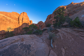 hiking the broken arch trail in arches national park, utah, usa