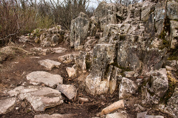 Rocks on Koenigsstuhl at Thunder Mountain in Dannenfels in Germany on a cloudy spring day in the Palatinate Forest.