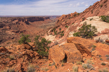 hiking the syncline loop trail in island in the sky district of canyonlands national park, utah, usa
