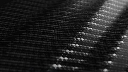 close up of carbon fiber weave black lens blur
