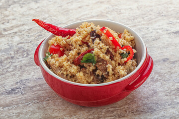 Arabic cous cous with meat and tomato