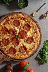 pepperroni pizza on a wooden board