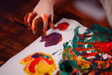 Cute little girl and boy painting with fingers at home. Creative games for kids. Stay at home...