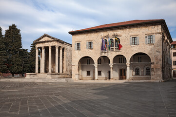 Pula, Istria, Croatia: the ancient Roman Temple of Augustus and the town hall in the downtown of the city