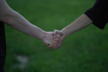 close up of hands holding hands