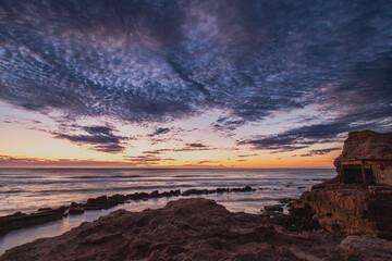 Fototapeta na wymiar Sunrise on the beach with colorful sky