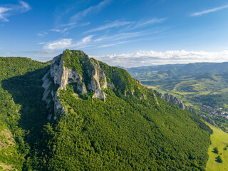 Fototapeta na wymiar Romania - Torockó - The amazing Székelykő hills and rocks from drone view (Original romanian name is: Piatra Secuiului)