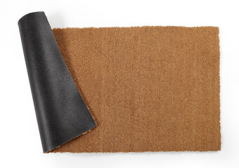 Natural brown coconut fiber doormat. Plain natural dry carpet and dirt outside your entrance, Detail, closeup of fiber and base on white background.