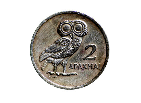 2 drachma coin from greece (greek money currency) with owl face, pre-euro finance business (old collectible) isolated on white background (cut out)