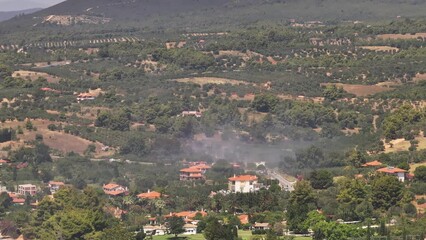 THESSALONIKI, GREECE - JULY 28, 2023: Aerial Footage: Wildfire Engulfs Forest in Greece - Thessaloniki